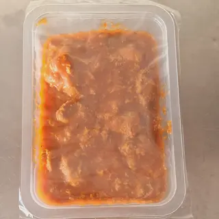 Carne con tomate