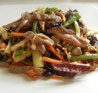 Cerdo Con Verdura Variadas