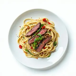Spaghetti cinesi con vitello alla piastra