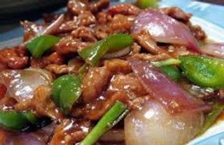 64.Ternera con salsa de ostras