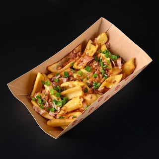 Картопляні діпи з беконом під сирним соусом (220г)