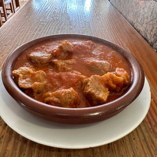 Tapa De Carne De Cerdo Con Tomate
