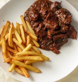 Pan fried Liver and Chips served with a soda or water 