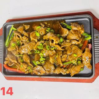 314 Cordero Con Salsa Pimienta Negra