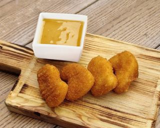 Курячі нагетси з гірчичним соусом (100/50г)