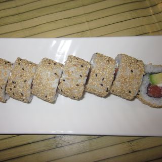 65-Uramaki Salmón, Aguacate Y Sésamo (8 Pzs.)