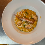 Risotto con crema de calabaza y gambas 