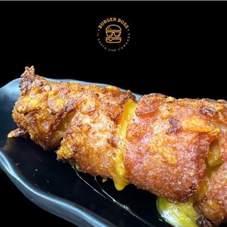 Churros bacon e cheddar con panatura cornflakes