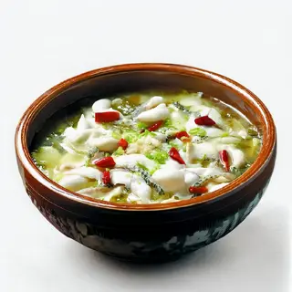 S40 Filetto di pangasio con verdure in brodo agropiccante
