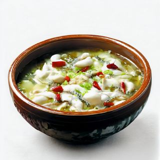 S40 Filetto di pangasio con verdure in brodo agropiccante