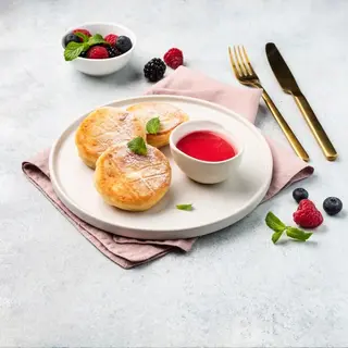 Сирники зі сметаною та джемом (150/30г)