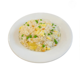 Riso saltato con ananas e pinoli