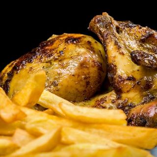 1 Pollastre a l'ast de llenya