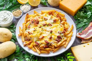 Patatas fritas con cheddar (grande)