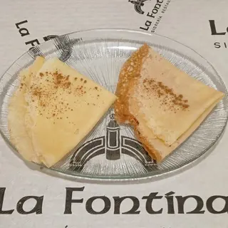 Frixuelos rellenos de arroz con leche