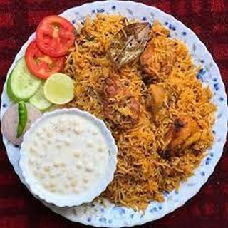 Chicken Biriani With Raita & Salad