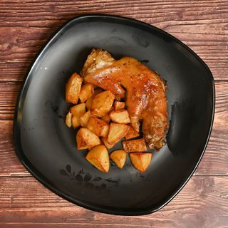 1/2 Pie de cerdo a la leña