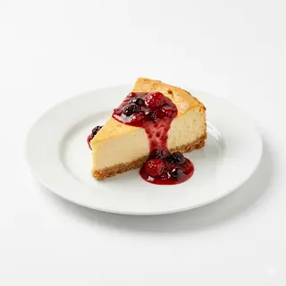 Tarta De Queso Con Coulis De Frutos Rojos