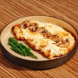 Schnitzel with cheese and mushrooms