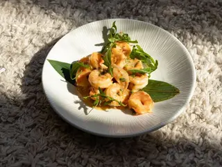 Креветки під вершковим соусом (180g)