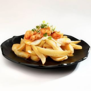 Huevos Con Gambón Al Ajillo