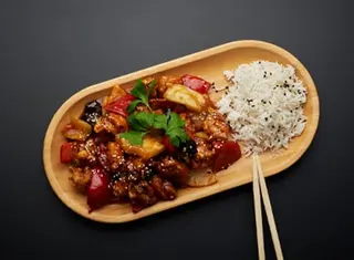 Carne de porc în stil chinezesc cu ananas