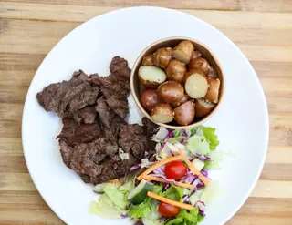 Grilled Mini Steaks With garden salad.