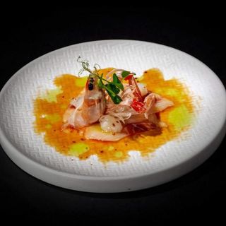 Carpaccio di scampi e branzino