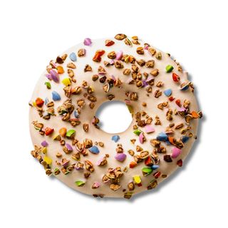 Донат з білою глазур'ю та подрібненими шоколадними цукерками (56г)