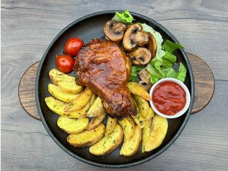 Свинний стейк на кісточці 250/150г