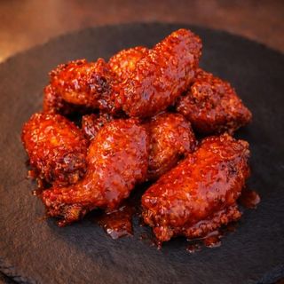 ¡NEW! Alitas de Pollo Bravas style (picantes)