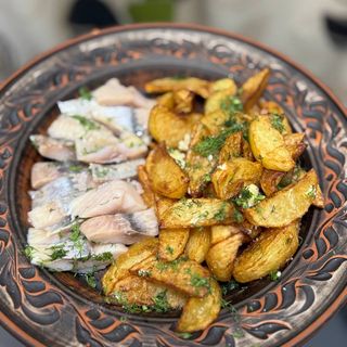 Картопля по-селянськи з оселедцем