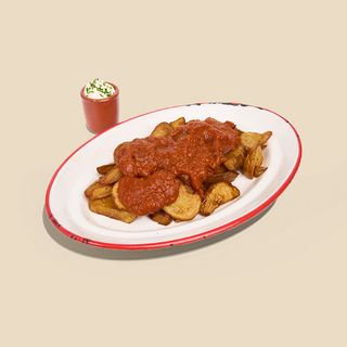 Ración de bravas de las de perretxico