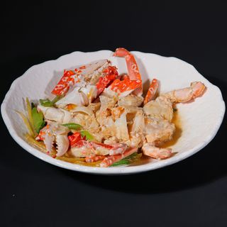 Granchio con zenzero e porri