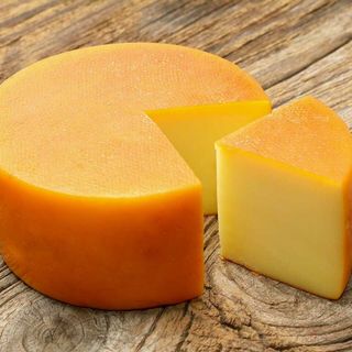 tabla de quesos con grisinis