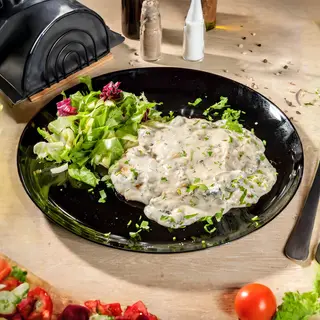 Escalop de porc cu ciuperci