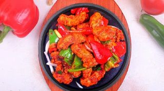 Жаровня из филе форели с овощами