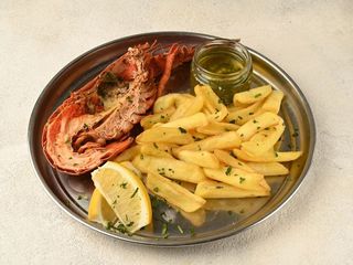 Лобстер половинка на пару з розтопленим вершковим маслом (150/40g)