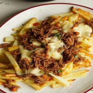 Ración De Papas Locas Con Mechada