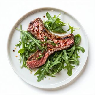 Bistecca di maiale con rucola