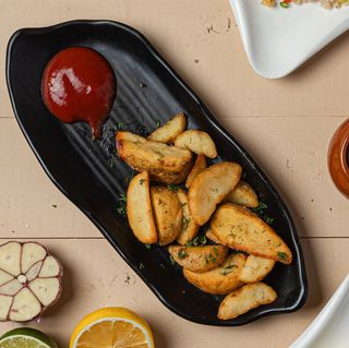 Картофель по-деревенски (130гр)