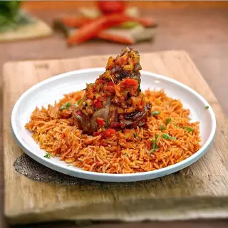 4 Spoons of Jollof Rice & 4 Beef