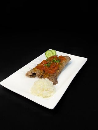 Рулетки из говядины в томатном соусе