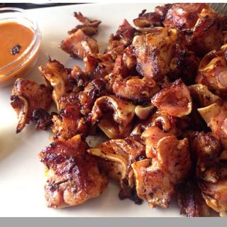 Ración De Oreja Plancha Con Salsa Brava