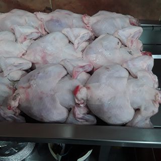 Dos pollos asados con patata horno 