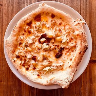 Pizza de Pollo a l'ast