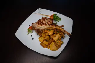 Cotlet de porc cu os gratar 