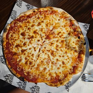 Pizza al gusto tomate