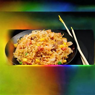 Riso saltato con pollo e verdure al curry