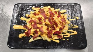 Patatine Fritte  con salsa Cheddar e Bacon
